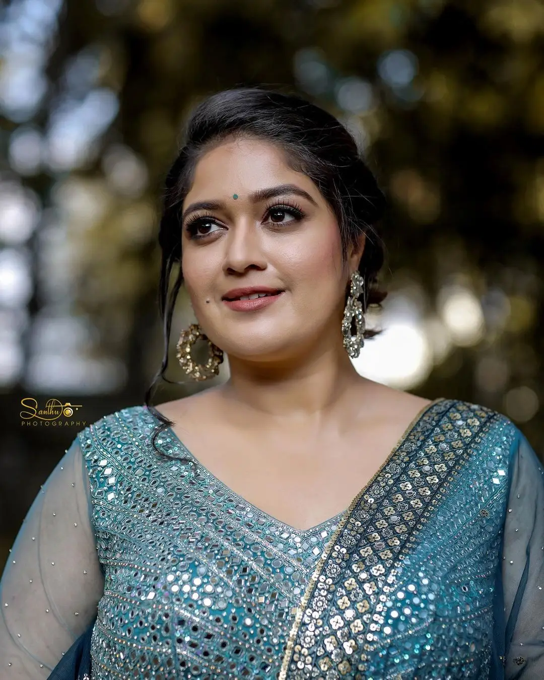 Actress Meghana Raj Stills in Beautiful Blue Designer Gown